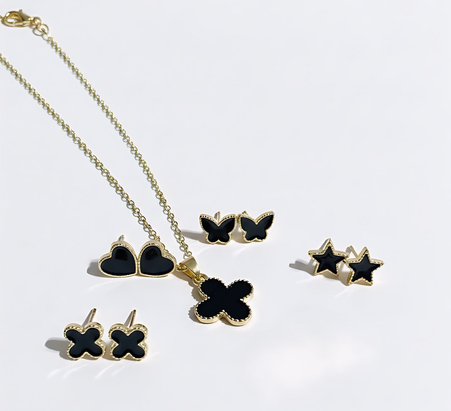 5-in-1 Black Enamel Stainless Steel Necklace and Multi-Stud Earring Set