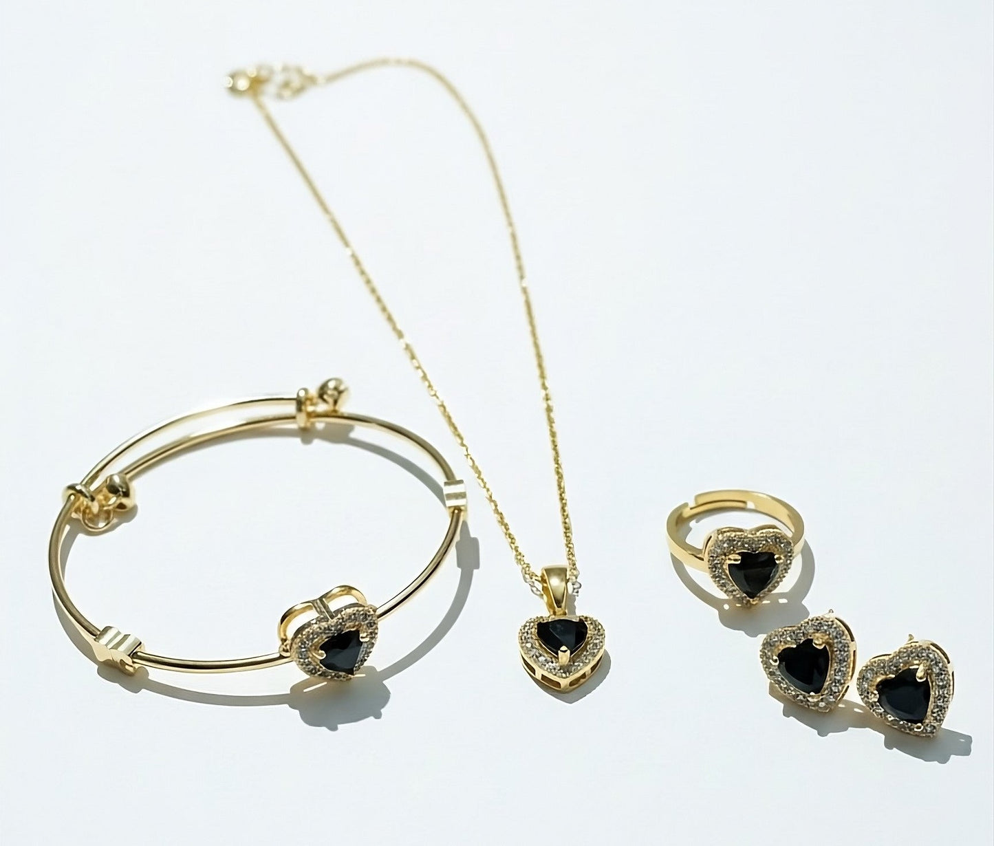 4-Piece Gold-Plated Stainless Steel Heart Jewelry Set with Black Stone Accents